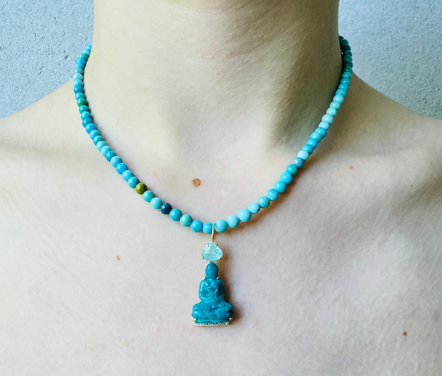 Turquoise Beads with Gem Silica Buddha Carving Sitting on Diamonds with Paraiba
