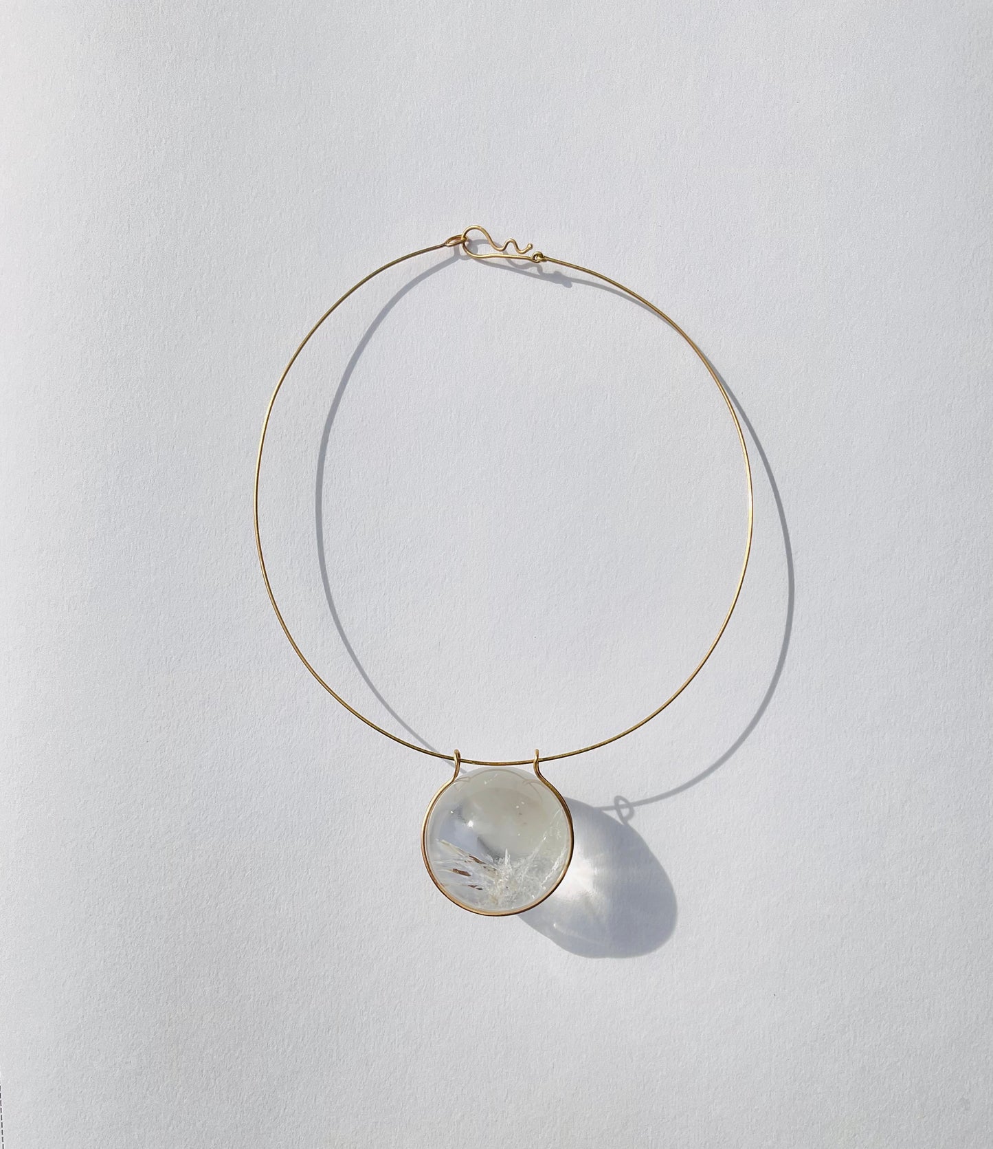 Quartz Healing Sphere on Gold Necklace.