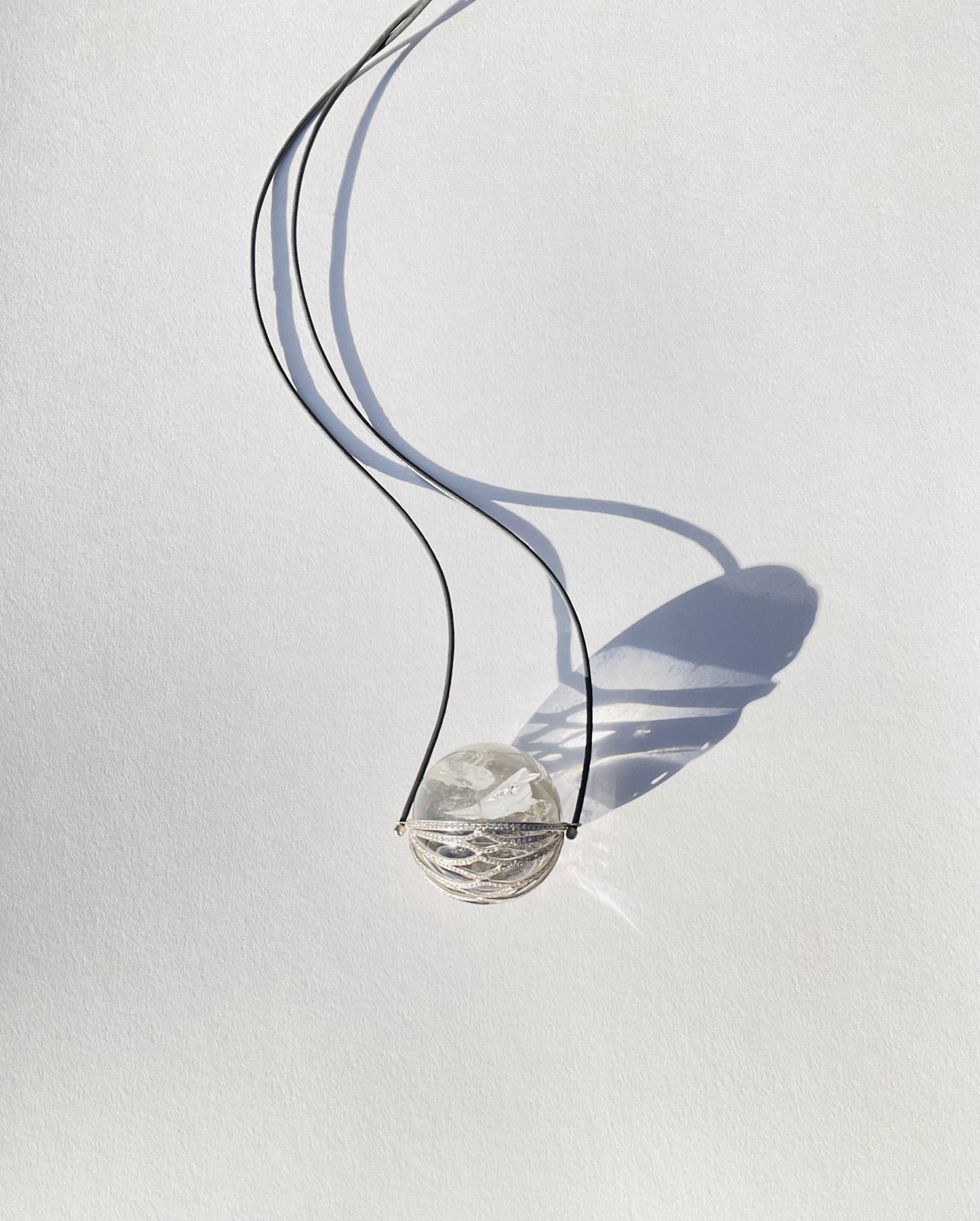 White Gold Diamond Basket with Quartz Healing Sphere.