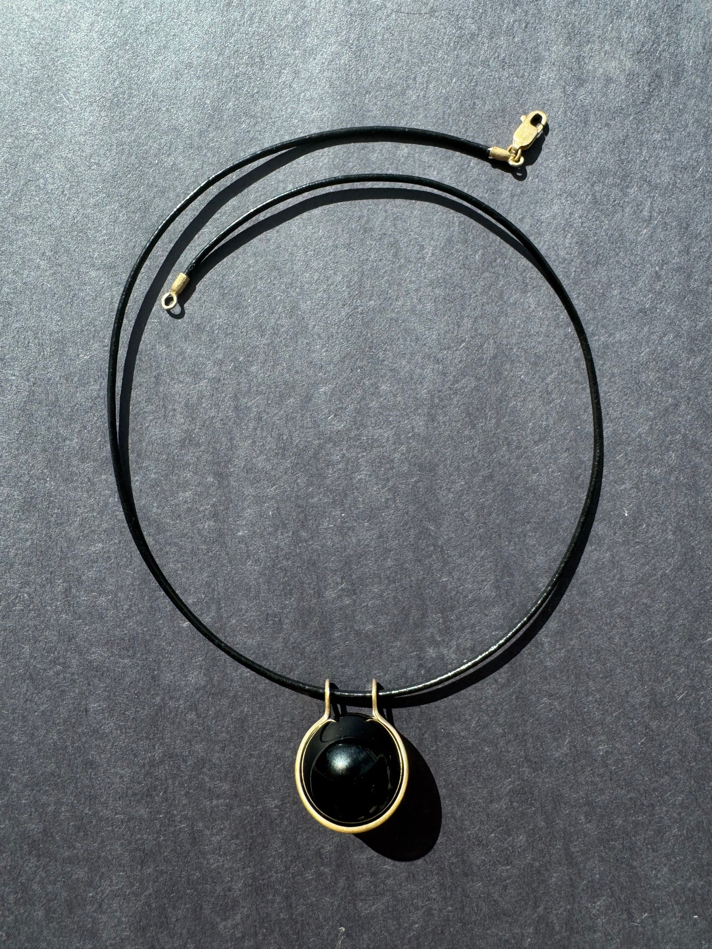 Black Agate Healing Sphere on Leather Cord.
