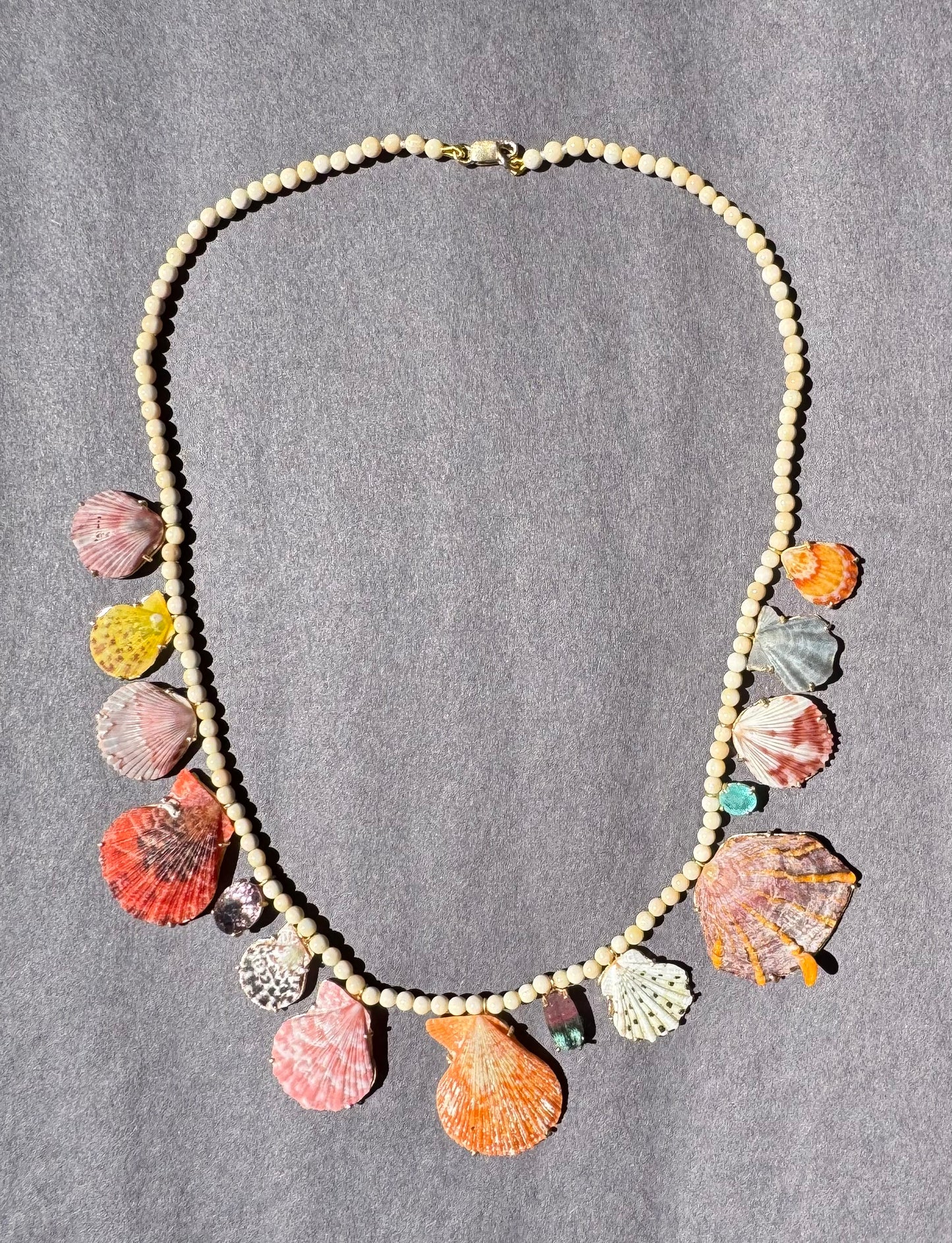 Rare Shells, Bi Color Tourmaline, Tourmaline and Paraiba on Wooly Mammoth Beads