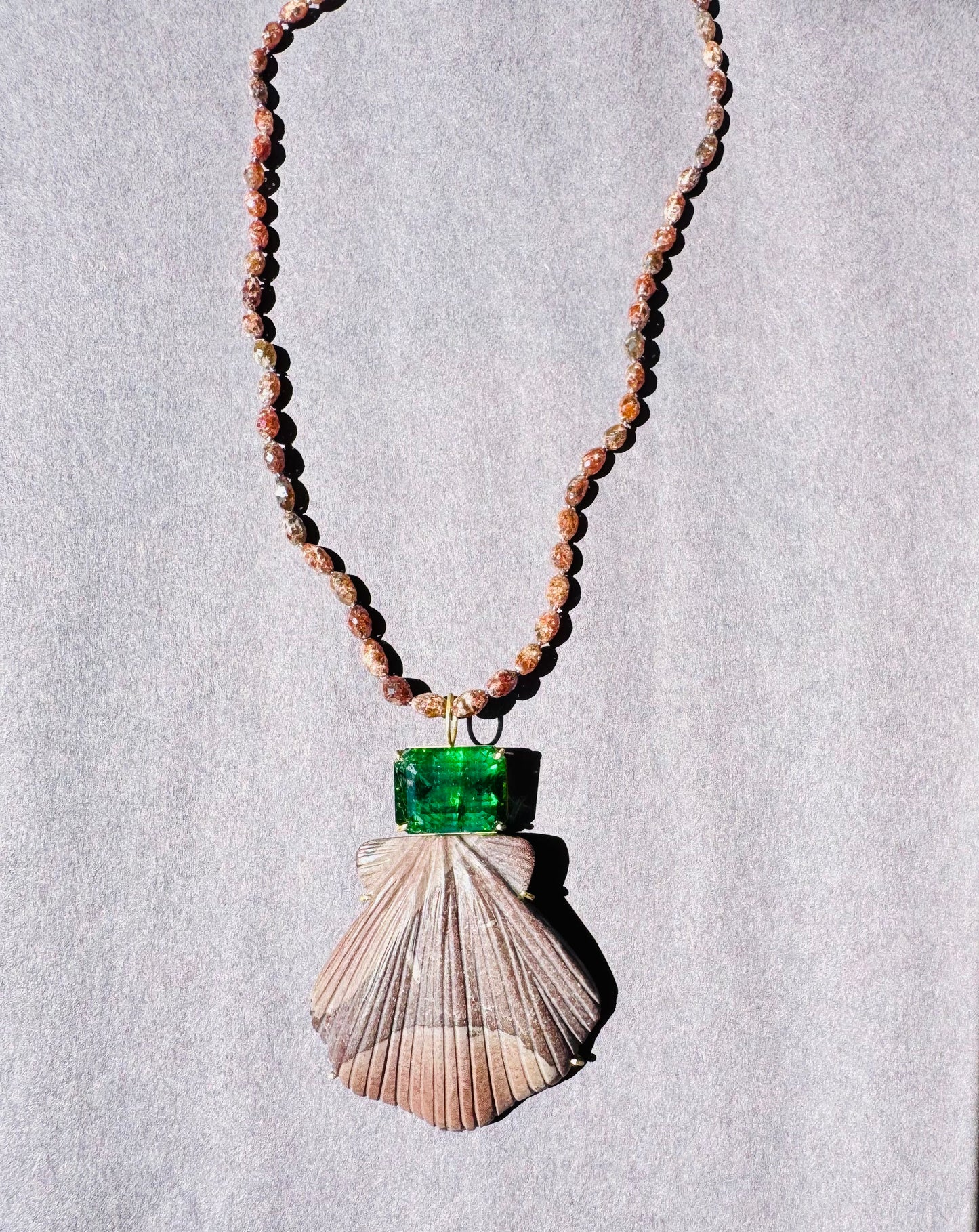 Brown Jade Shell Carving with Tourmaline and Brown Diamonds.
