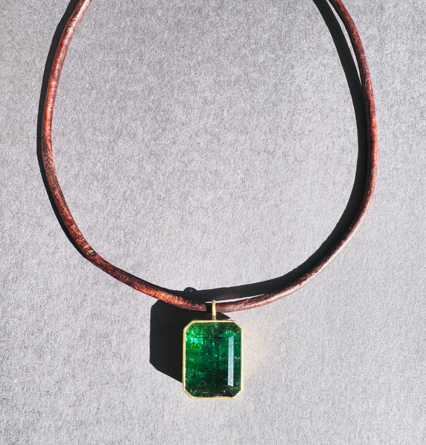 Green Tourmaline on Distressed Brown Leather Cord.