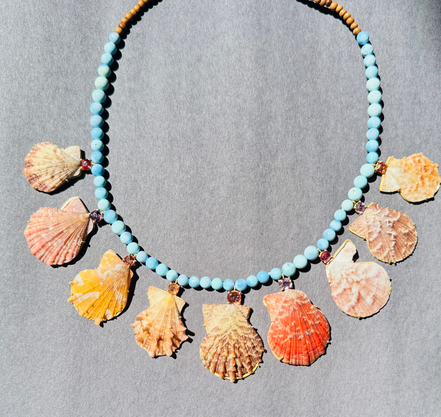 Golden Hills Turquoise with Rare Shells and Spinel.