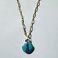 Turquoise and Chaorite Shell Carving Pendant with Aquamarine