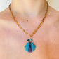 Turquoise and Chaorite Shell Carving Pendant with Aquamarine