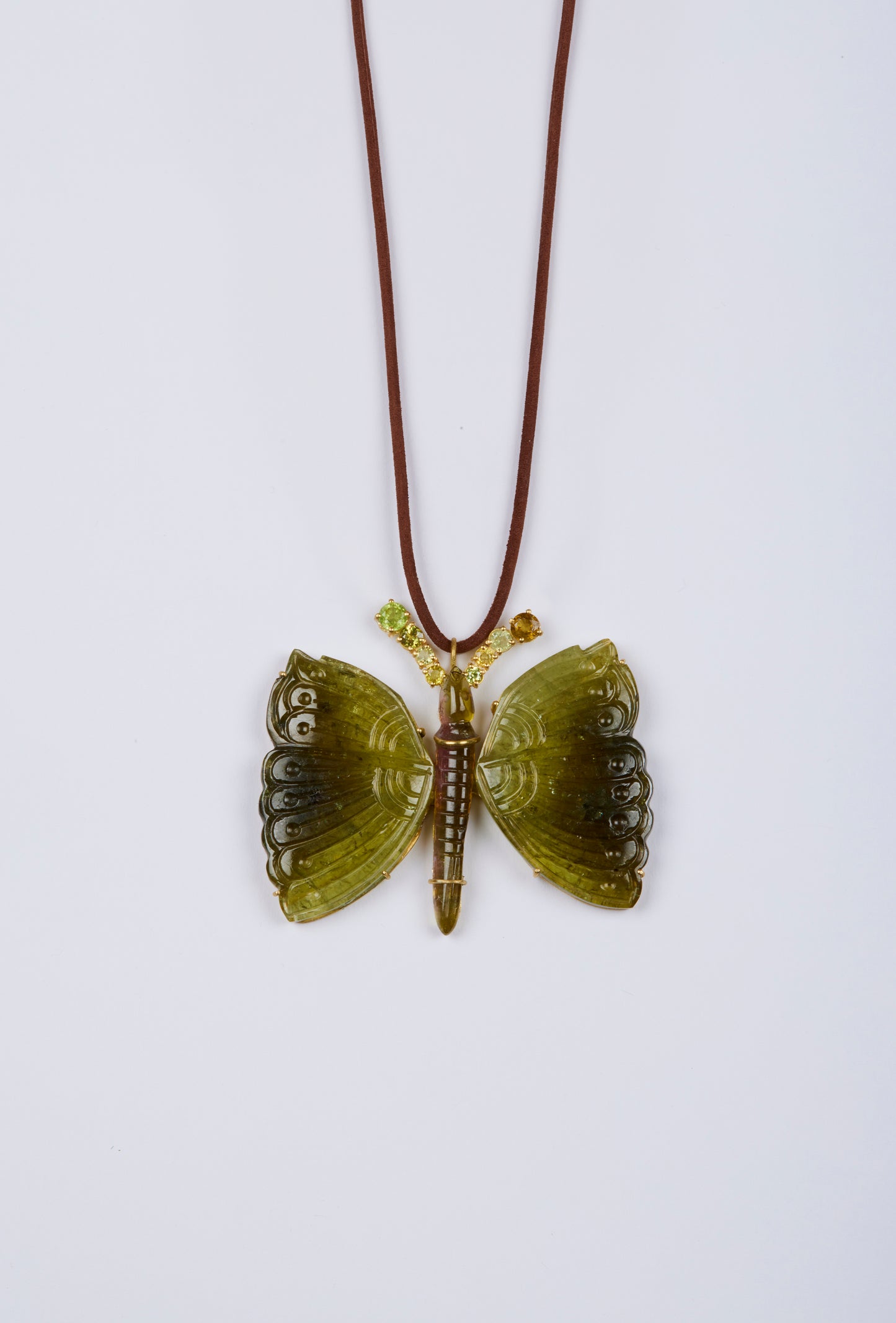 Bi Color Butterfly Carving Pendant with Sphene Antennae on Brown Cord