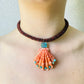 Lions Paw Shell with Tourmaline, Diamonds and Turquoise on Jasper embroidered cord
