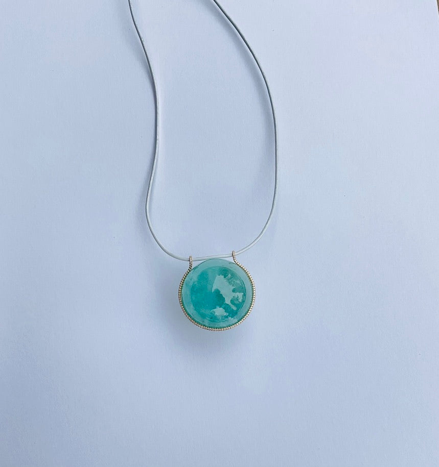 Aquamarine Healing Sphere with Diamonds set in Yellow Gold.