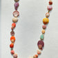 Multi Long Shell Necklace with Gems and Diamonds