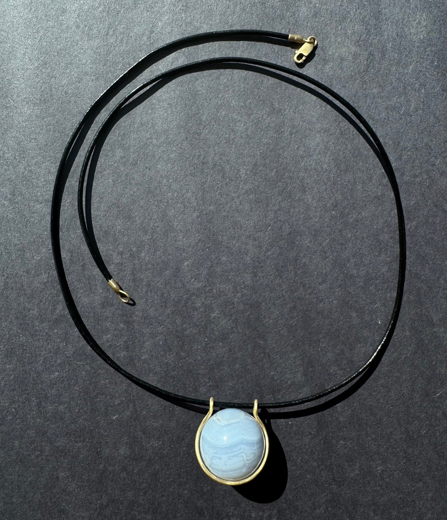 Chalcedony Healing Sphere on Leather Cord.