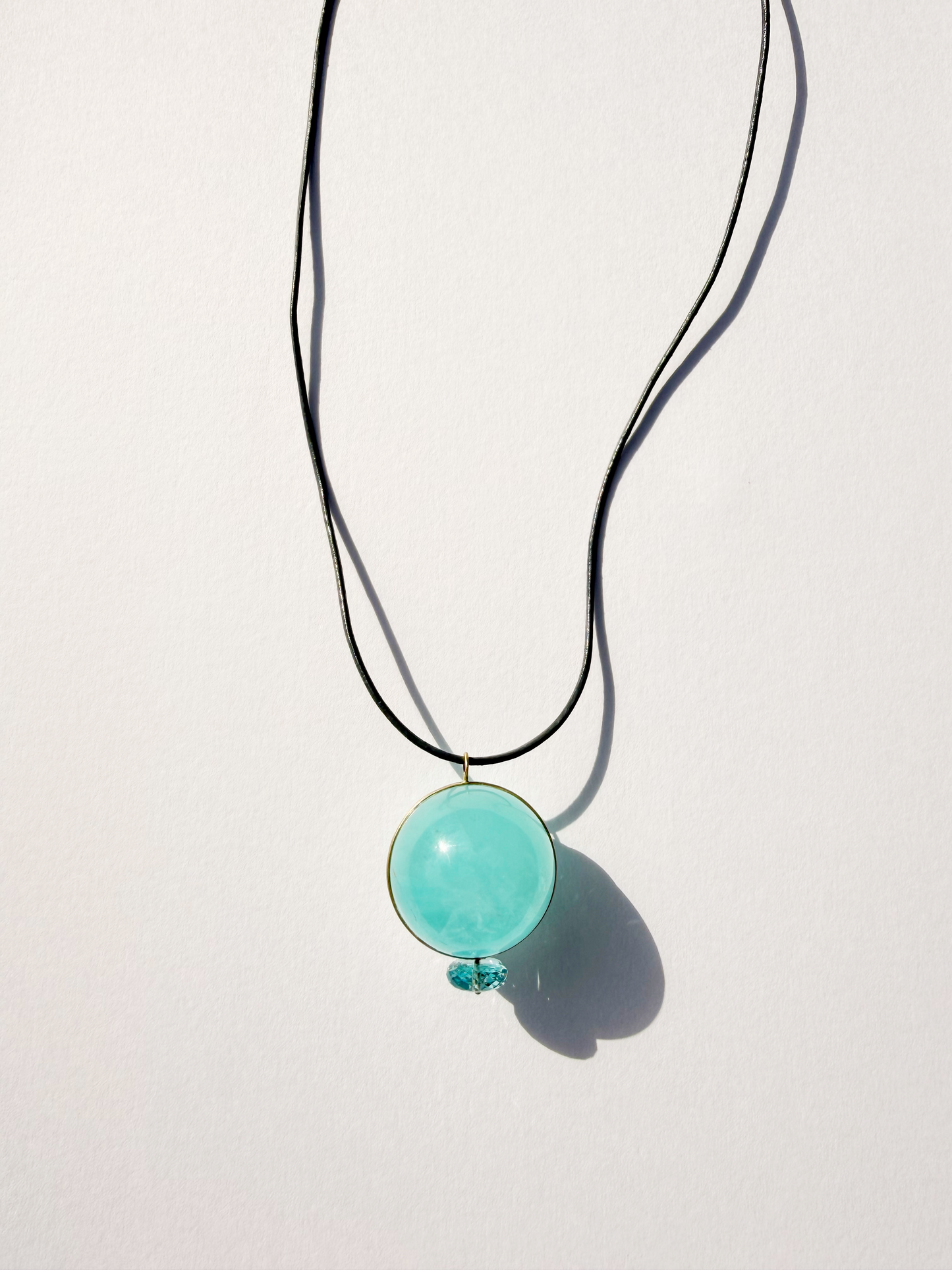 Aquamarine Healing Sphere with Faceted Aquamarine.